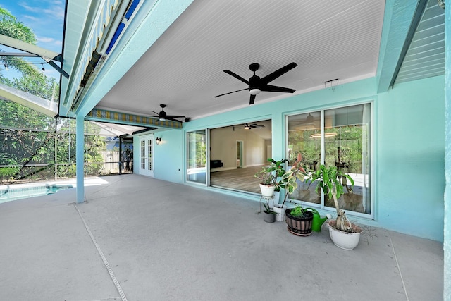 139 NE Royce Ave, Port Saint Lucie, FL 34983 - view of patio / terrace featuring ceiling fan and glass enclosure