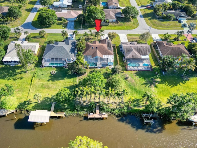 139 NE Royce Ave, Port Saint Lucie, FL 34983 - aerial perspective of suburban area featuring a large body of water