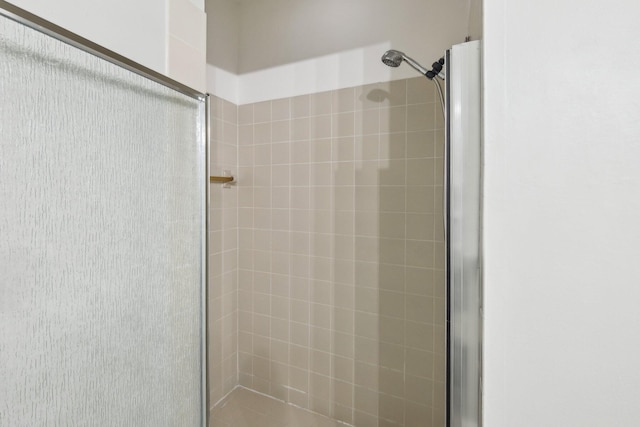 full bath featuring a stall shower