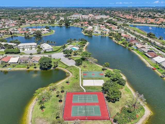 aerial view of residential area with a nearby body of water