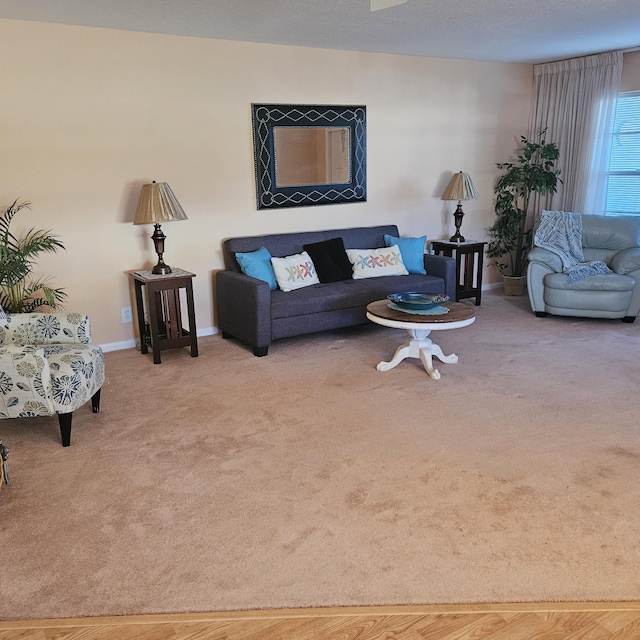 1779 W Royal Tern 1 Ln Unit 1, Fort Pierce, FL 34982 - carpeted living room featuring baseboards