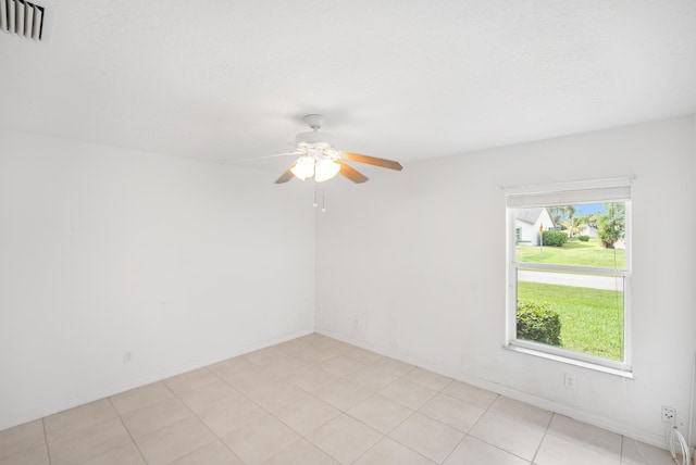 620 SE Stow Ter, Port Saint Lucie, FL 34984 - empty room featuring a ceiling fan and baseboards