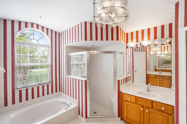 620 SE Stow Ter, Port Saint Lucie, FL 34984 - bathroom featuring wallpapered walls, a chandelier, a stall shower, a bath, and vanity