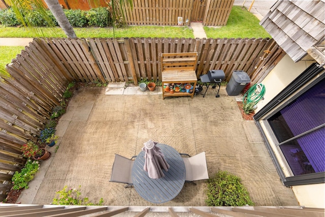 view of patio with fence