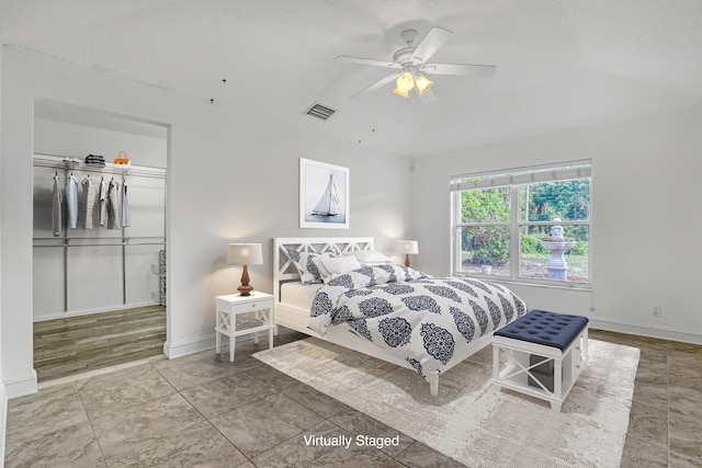3035 Casa Rio Ct, Riviera Beach, FL 33418 - bedroom featuring baseboards, a ceiling fan, lofted ceiling, a closet, and a spacious closet