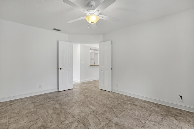 3035 Casa Rio Ct, Riviera Beach, FL 33418 - tiled empty room featuring ceiling fan