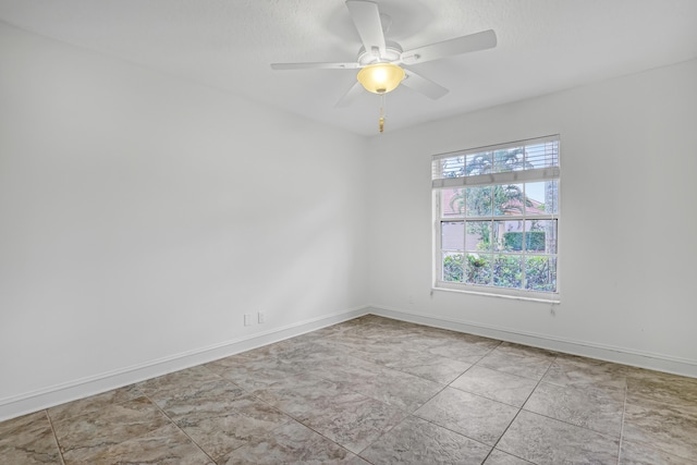 3035 Casa Rio Ct, Riviera Beach, FL 33418 - unfurnished room with baseboards and ceiling fan