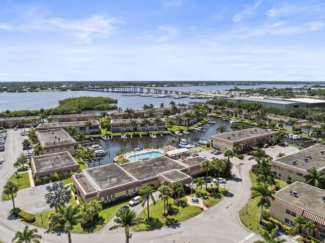 aerial view of a nearby body of water and a notable bridge