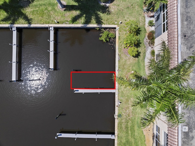 aerial view of property's location with a nearby body of water and property boundaries highlighted