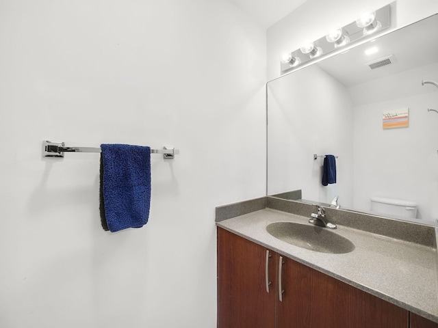 4167 Crystal Lake Dr, Deerfield Beach, FL 33064 - bathroom with vanity and toilet