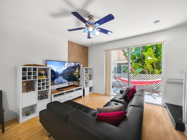 4167 Crystal Lake Dr, Deerfield Beach, FL 33064 - living room with ceiling fan, light wood-style flooring, healthy amount of natural light, and baseboards