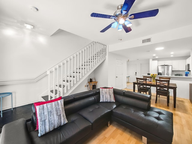 4167 Crystal Lake Dr, Deerfield Beach, FL 33064 - living room featuring ceiling fan, stairway, light wood finished floors, and recessed lighting