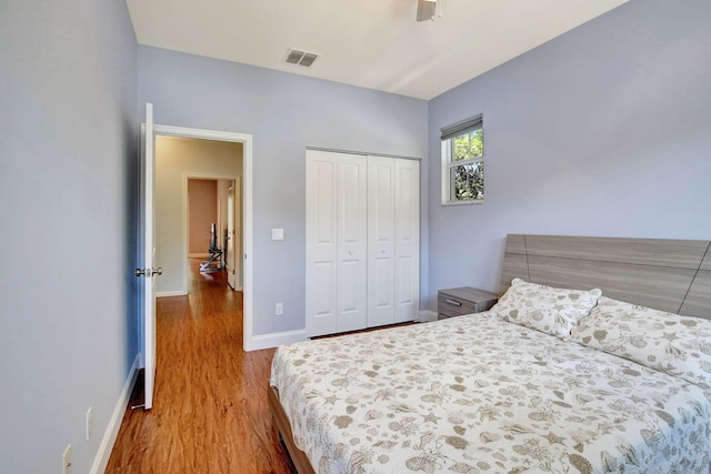 4128 Cascada Cir, Cooper City, FL 33024 - bedroom with wood finished floors, a closet, baseboards, and ceiling fan