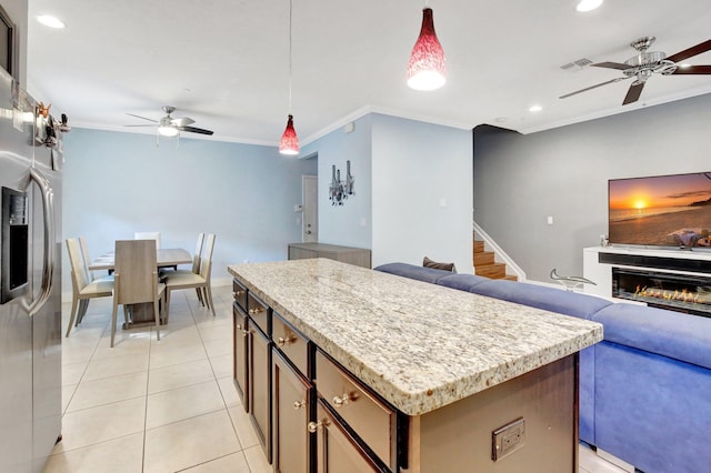 4128 Cascada Cir, Cooper City, FL 33024 - kitchen featuring a ceiling fan, stainless steel fridge with ice dispenser, open floor plan, crown molding, and recessed lighting
