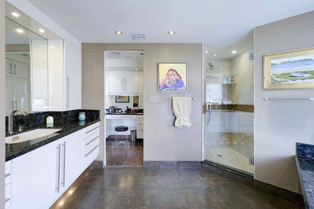 529 S Flagler Dr Unit 26H, West Palm Beach, FL 33401 - full bath featuring a stall shower, recessed lighting, and vanity