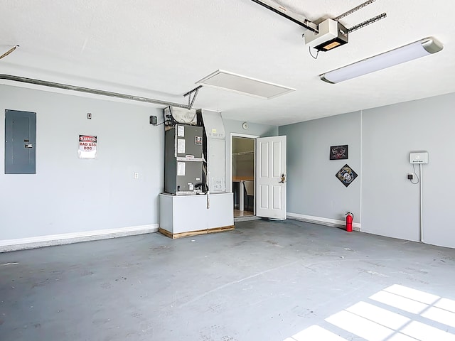garage with electric panel, heating unit, a garage door opener, and baseboards