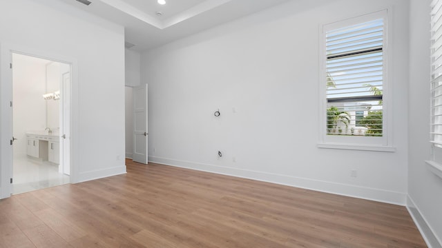 13250 Artisan Cir, Palm Beach Gardens, FL 33418 - unfurnished bedroom featuring light wood-type flooring, ensuite bath, and recessed lighting