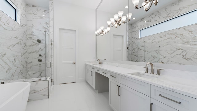 13250 Artisan Cir, Palm Beach Gardens, FL 33418 - full bath featuring a marble finish shower, double vanity, a freestanding tub, a chandelier, and plenty of natural light
