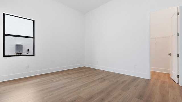 13250 Artisan Cir, Palm Beach Gardens, FL 33418 - spare room featuring light wood-style floors