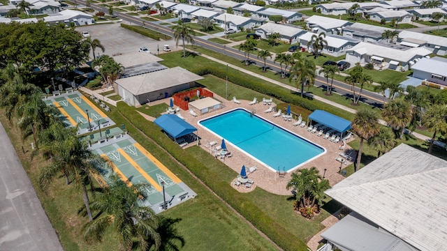 aerial perspective of suburban area with a pool area