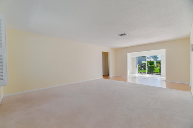 631 SW 21st Cir, Boynton Beach, FL 33426 - unfurnished room featuring light carpet and baseboards