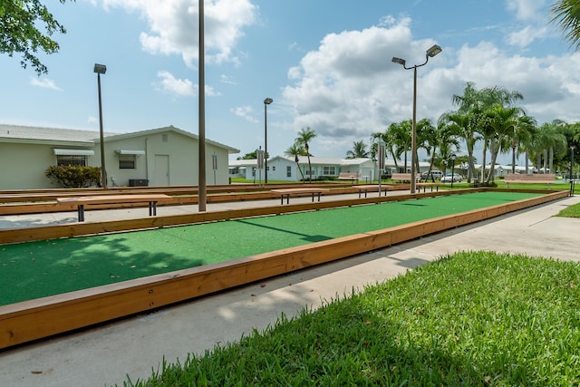 view of home's community with a bocce ball area and a residential view