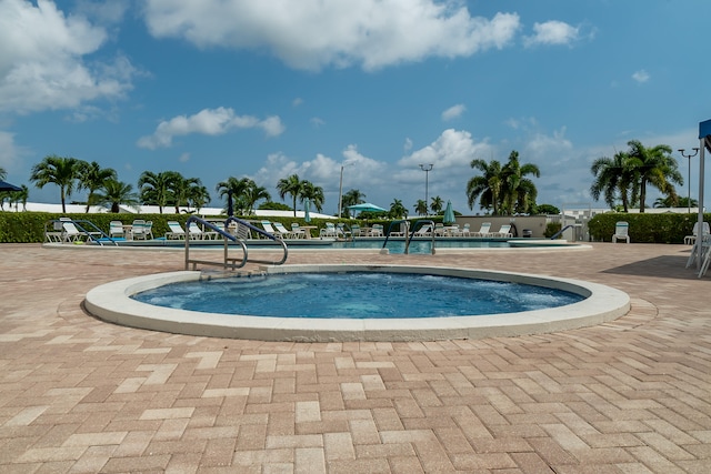 community pool with a patio