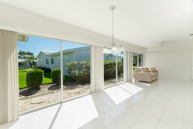 631 SW 21st Cir, Boynton Beach, FL 33426 - sunroom / solarium featuring a chandelier and plenty of natural light