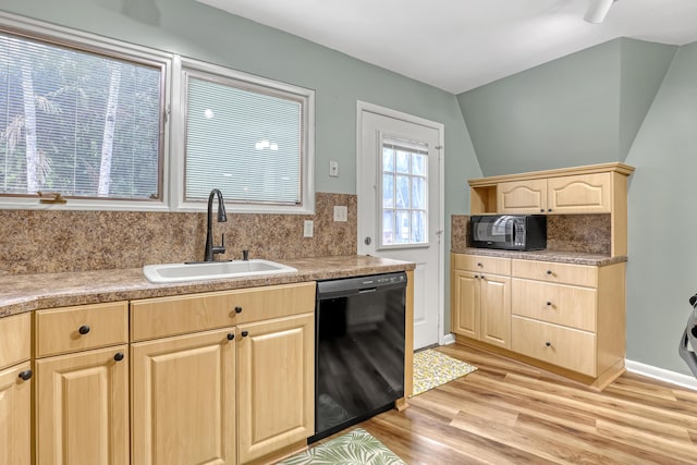 1130 Melinda Ln, Haverhill, FL 33417 - kitchen featuring black appliances, light brown cabinets, a sink, light wood-type flooring, and tasteful backsplash