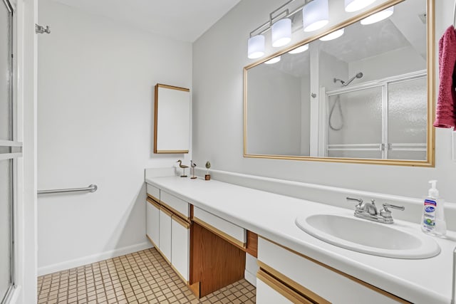 1130 Melinda Ln, Haverhill, FL 33417 - bathroom with a stall shower and double vanity