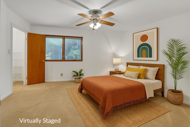 1130 Melinda Ln, Haverhill, FL 33417 - bedroom with light carpet, baseboards, and ceiling fan