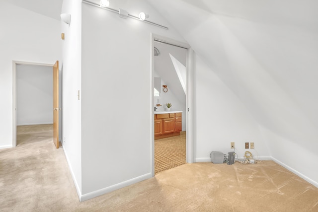 1130 Melinda Ln, Haverhill, FL 33417 - additional living space with lofted ceiling, light carpet, and baseboards