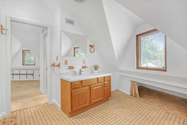 1130 Melinda Ln, Haverhill, FL 33417 - bathroom featuring vaulted ceiling and vanity