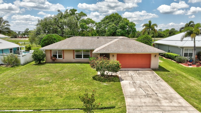 472 SW Aster Rd, Port Saint Lucie, FL 34953 - single story home featuring an attached garage, concrete driveway, and stucco siding