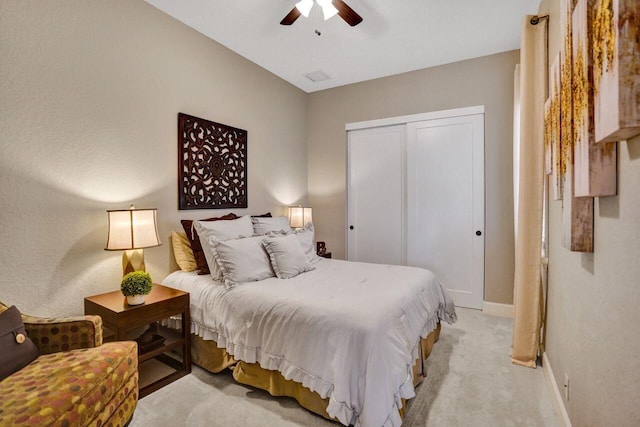 11354 Mainsail Ct, Wellington, FL 33449 - bedroom with baseboards, a closet, light carpet, and ceiling fan