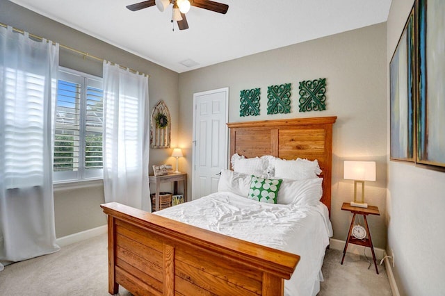 11354 Mainsail Ct, Wellington, FL 33449 - bedroom with light colored carpet, baseboards, and ceiling fan