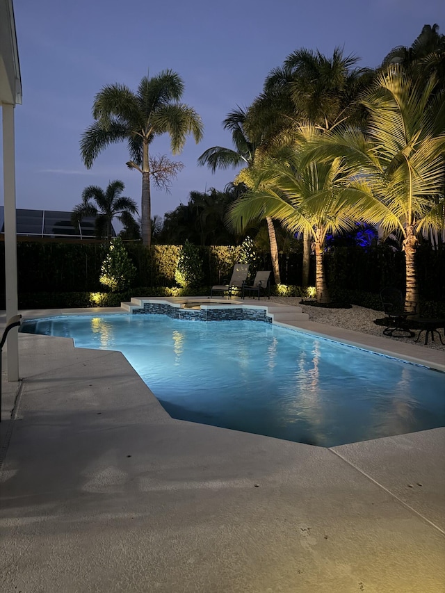 4620 SE Winter Haven Ct, Stuart, FL 34997 - view of swimming pool featuring a pool with connected hot tub and a patio area