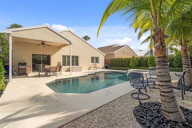 4620 SE Winter Haven Ct, Stuart, FL 34997 - view of swimming pool with ceiling fan, a patio area, and area for grilling