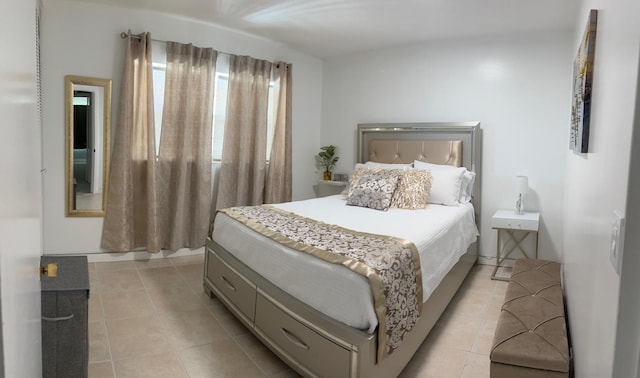 4441 NW 16th St Unit J210, Lauderhill, FL 33313 - bedroom featuring light tile patterned flooring