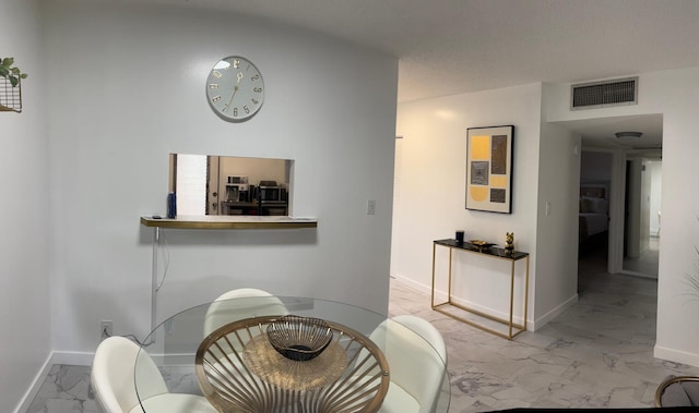 4441 NW 16th St Unit J210, Lauderhill, FL 33313 - dining room featuring marble finish floors and baseboards