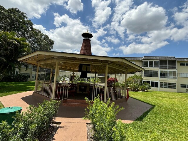 4441 NW 16th St Unit J210, Lauderhill, FL 33313 - view of patio / terrace featuring a gazebo