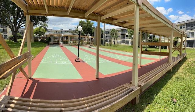 4441 NW 16th St Unit J210, Lauderhill, FL 33313 - view of home's community with a lawn and shuffleboard
