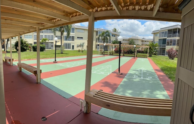 4441 NW 16th St Unit J210, Lauderhill, FL 33313 - view of property's community featuring a lawn and shuffleboard