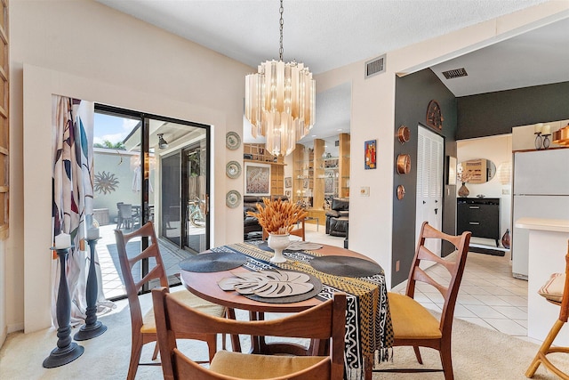 11 Meadows Dr, Boynton Beach, FL 33436 - dining room with a chandelier and light colored carpet