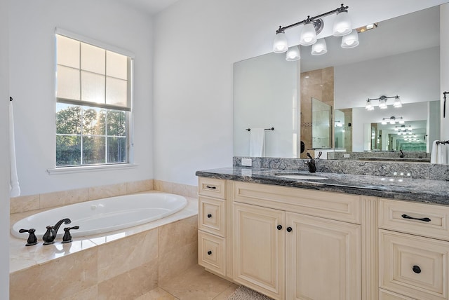 17736 103rd Ter N, Jupiter, FL 33478 - bathroom with a garden tub, vanity, tiled shower, and tile patterned floors