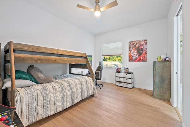 17736 103rd Ter N, Jupiter, FL 33478 - bedroom with wood finished floors, baseboards, and a ceiling fan