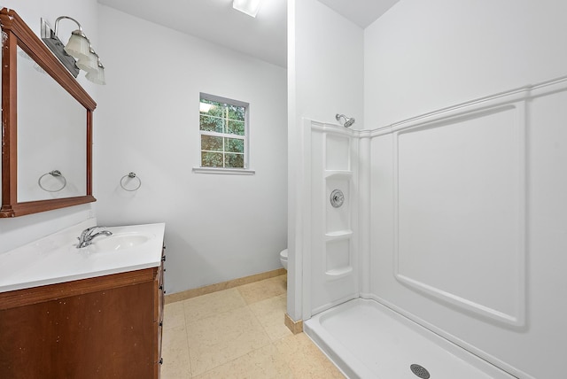 17736 103rd Ter N, Jupiter, FL 33478 - full bath featuring baseboards, a shower stall, vanity, and toilet