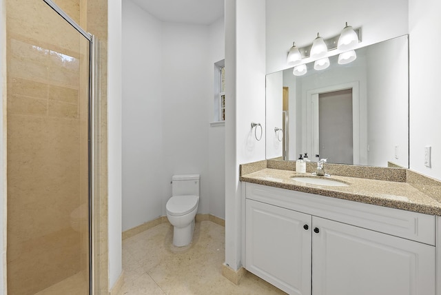 17736 103rd Ter N, Jupiter, FL 33478 - full bathroom featuring a shower stall, toilet, vanity, and baseboards