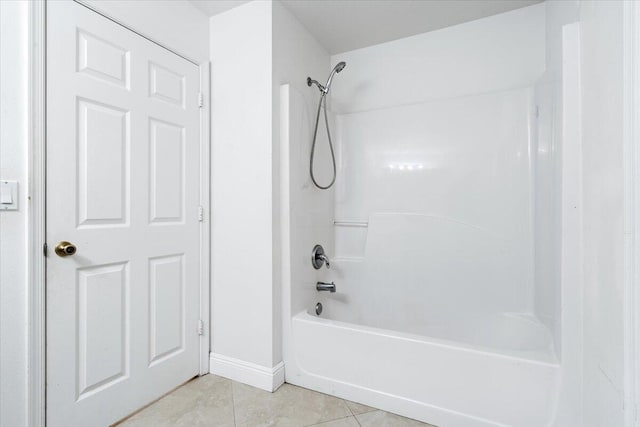 3925 SW Helmlinger St, Port Saint Lucie, FL 34953 - bathroom with tile patterned flooring, shower / bathtub combination, and baseboards