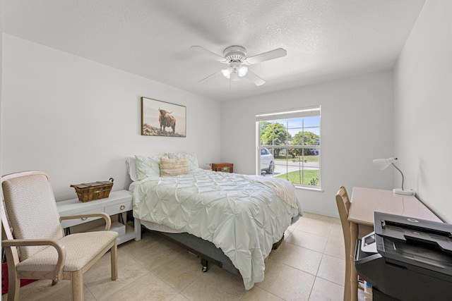 6905 Bayard Rd, Fort Pierce, FL 34951 - bedroom with a textured ceiling, ceiling fan, and light tile patterned floors